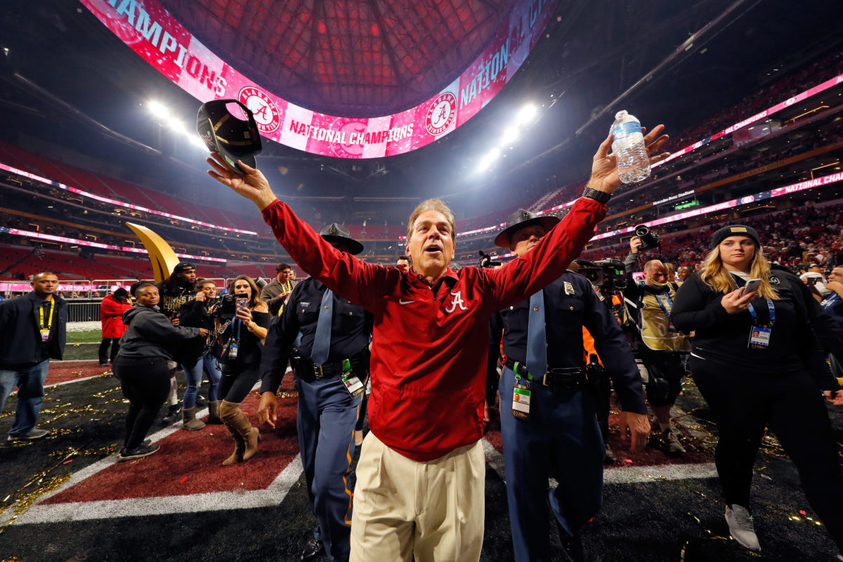 Head coach Nick Saban of the Alabama Crimson Tide celebrates beating the  Georgia Bulldogs in overtime to win the CFP National Championship.