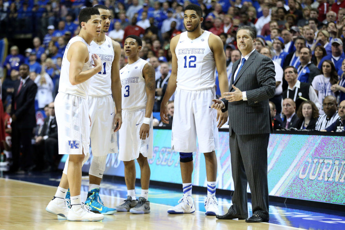 John Calipari stands with Karl-Anthony Towns.