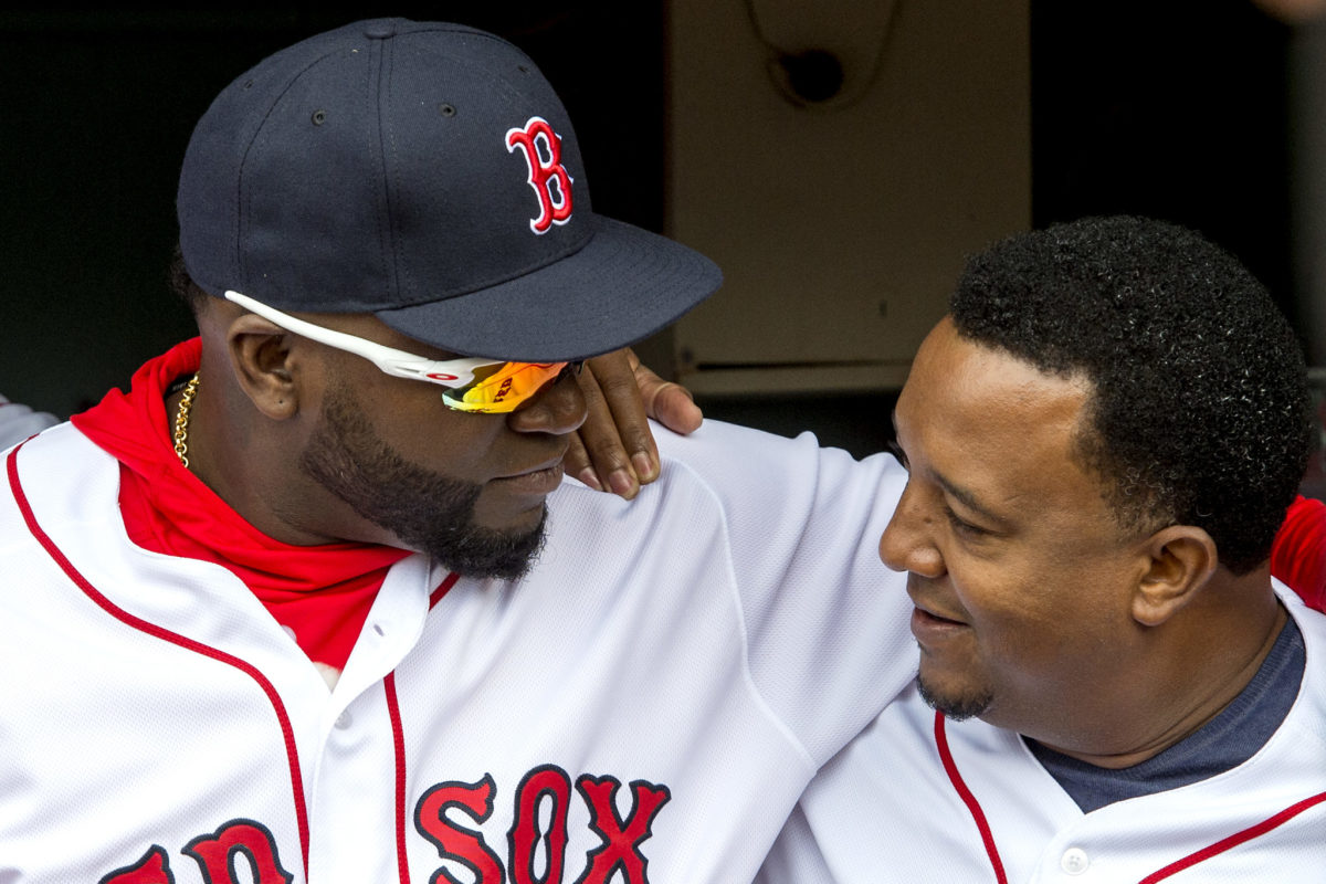 Pedro Martinez and David Ortiz with their arms around each other.