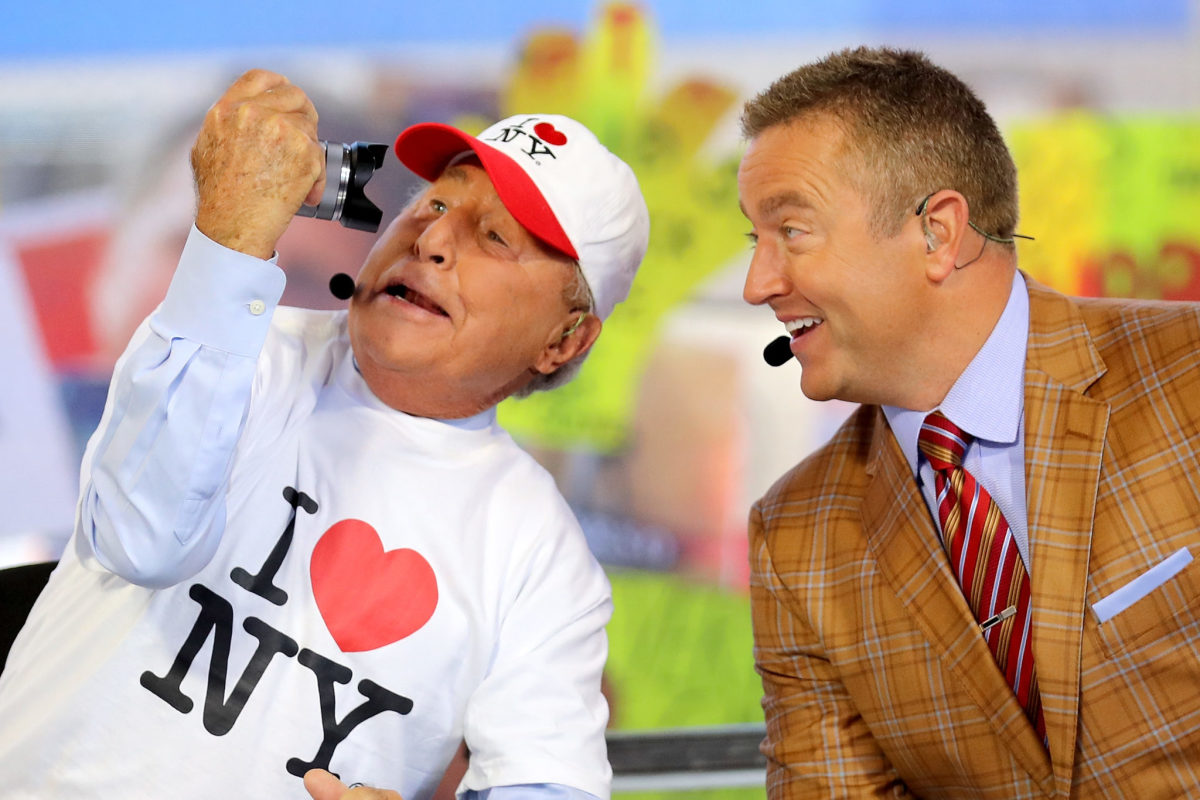 Lee Corso posing for a selfie with Kirk Herbstreit.