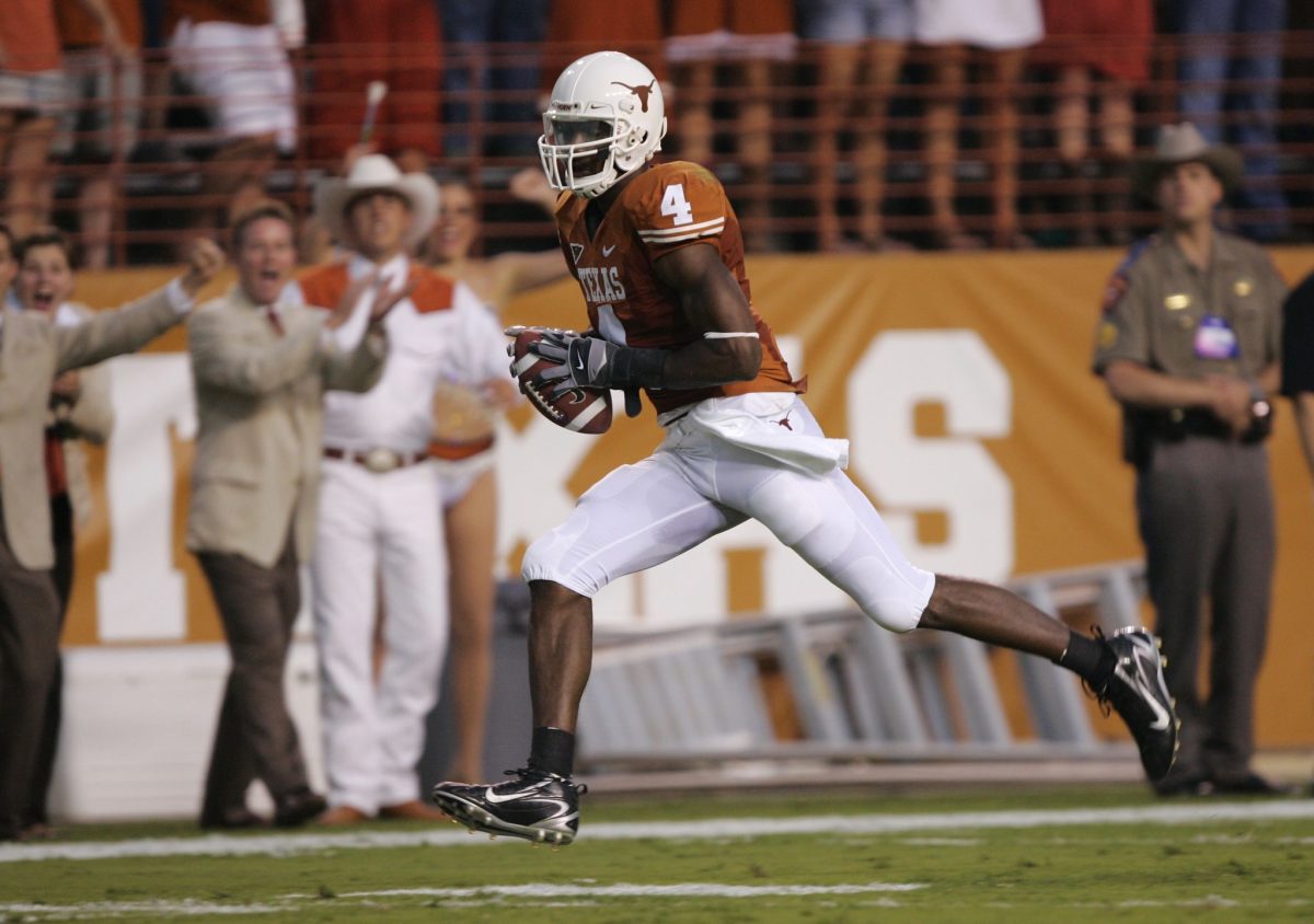Texas wide receiver Limas Sweed runs after a catch for a touchdown against Rice.