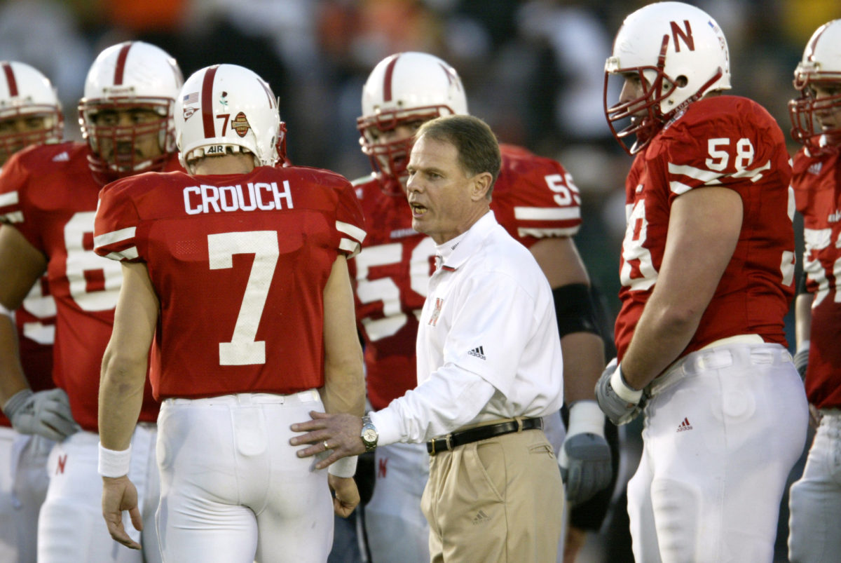 Frank Solich speaks with Eric Crouch at Rose Bowl, as Nebraska head coach.