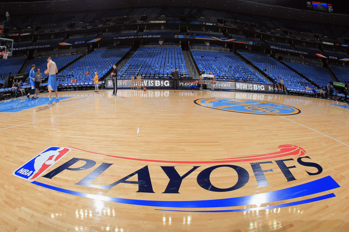 A view of the NBA Playoffs logo on the Denver Nuggets court.