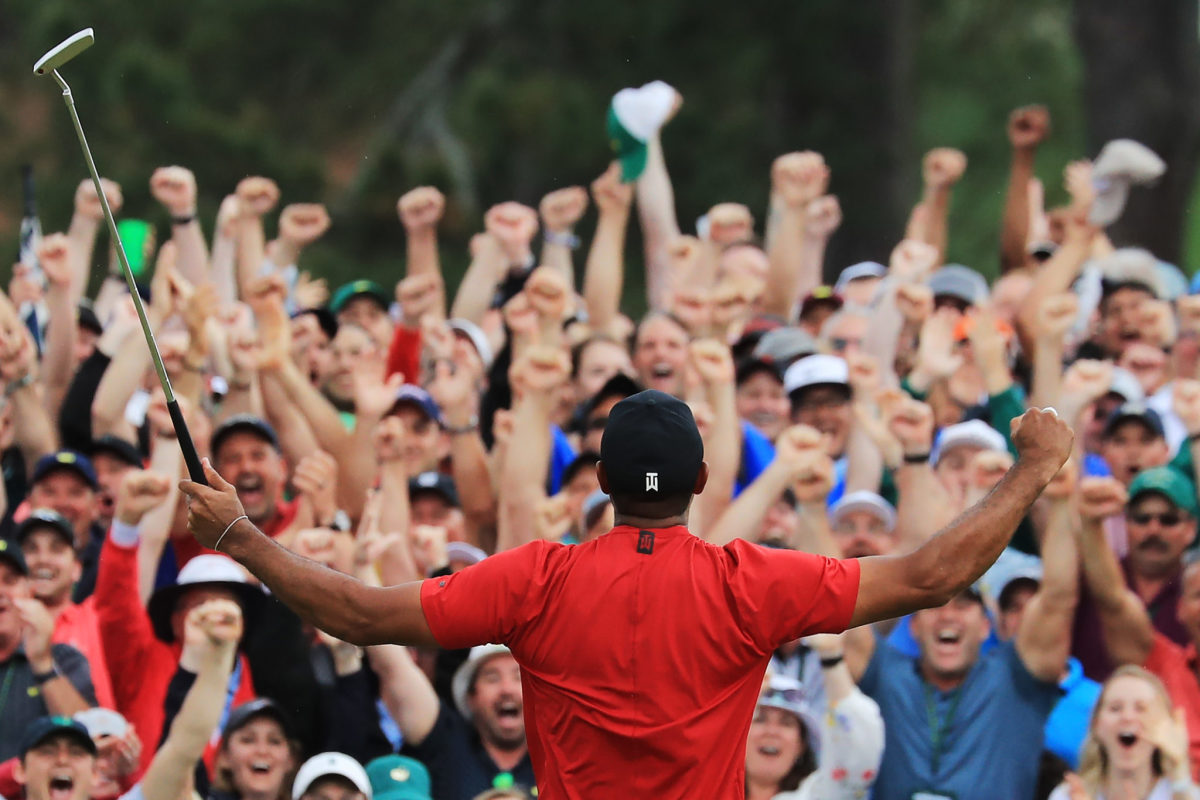 tiger woods celebrates at the 2019 masters