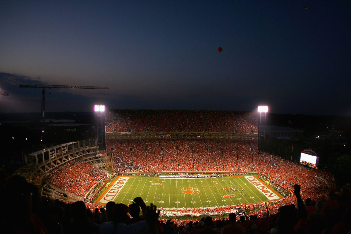 A view of Clemson's stadium at night from high up.