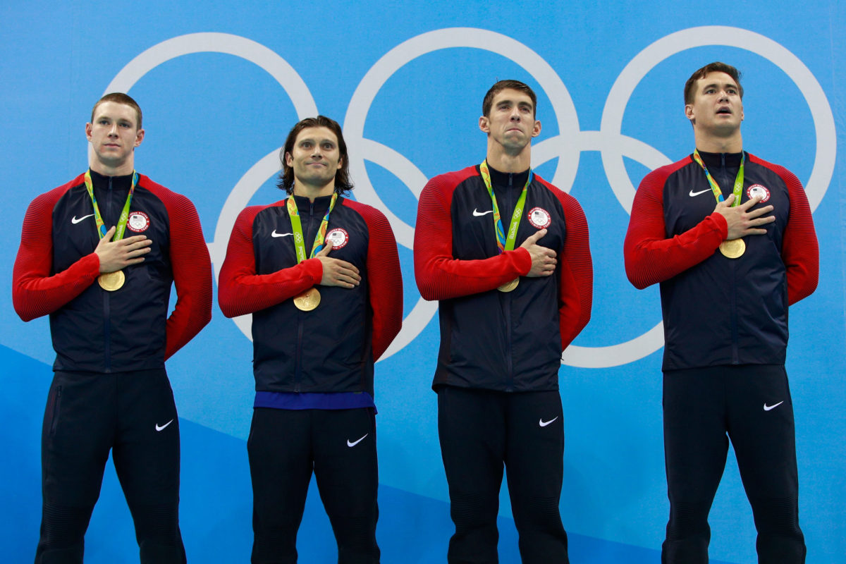 Nathan Adrian poses with his gold medal.