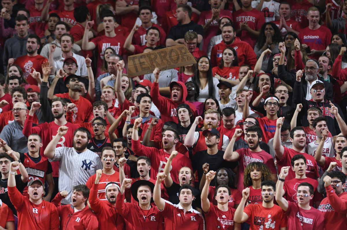 Rutgers fans celebrate in the crowd during the team's win over Maryland.