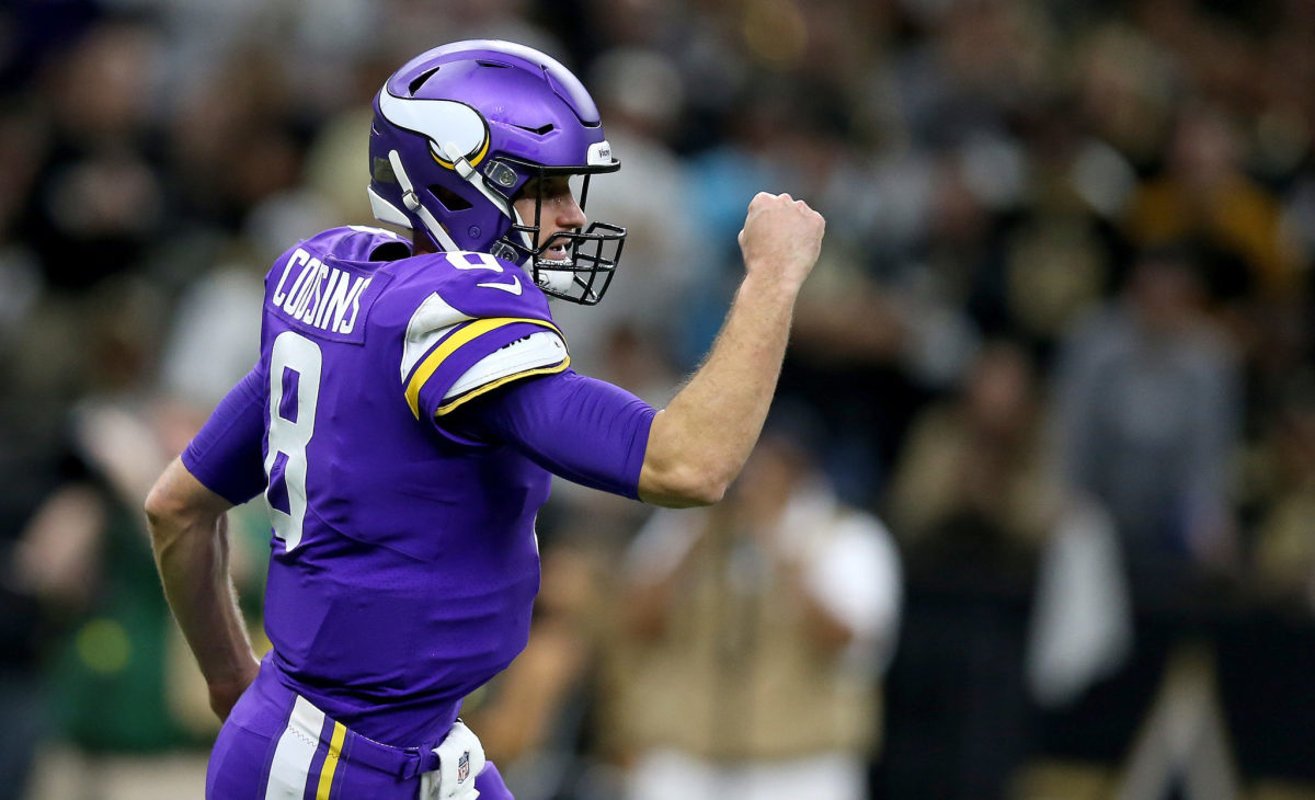 Minnesota Vikings quarterback Kirk Cousins celebrates the win over New Orleans.