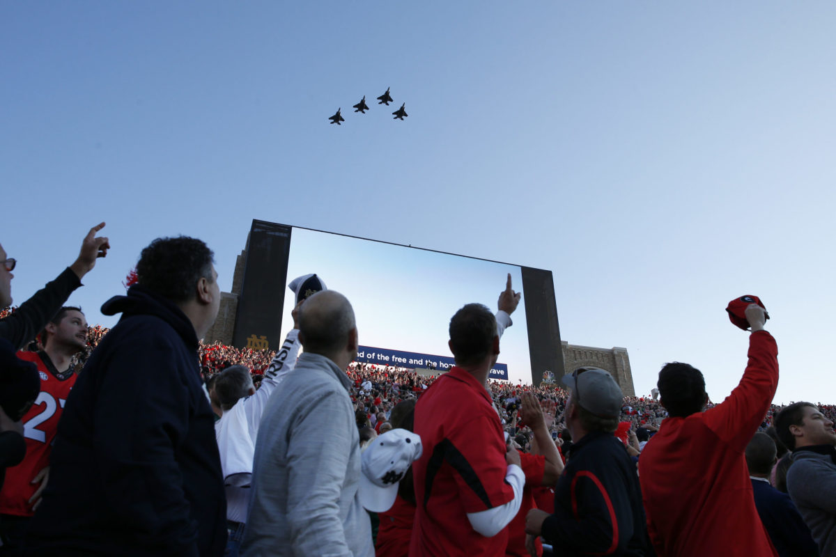 Georgia fans watch flyover ahead of game at Notre Dame.
