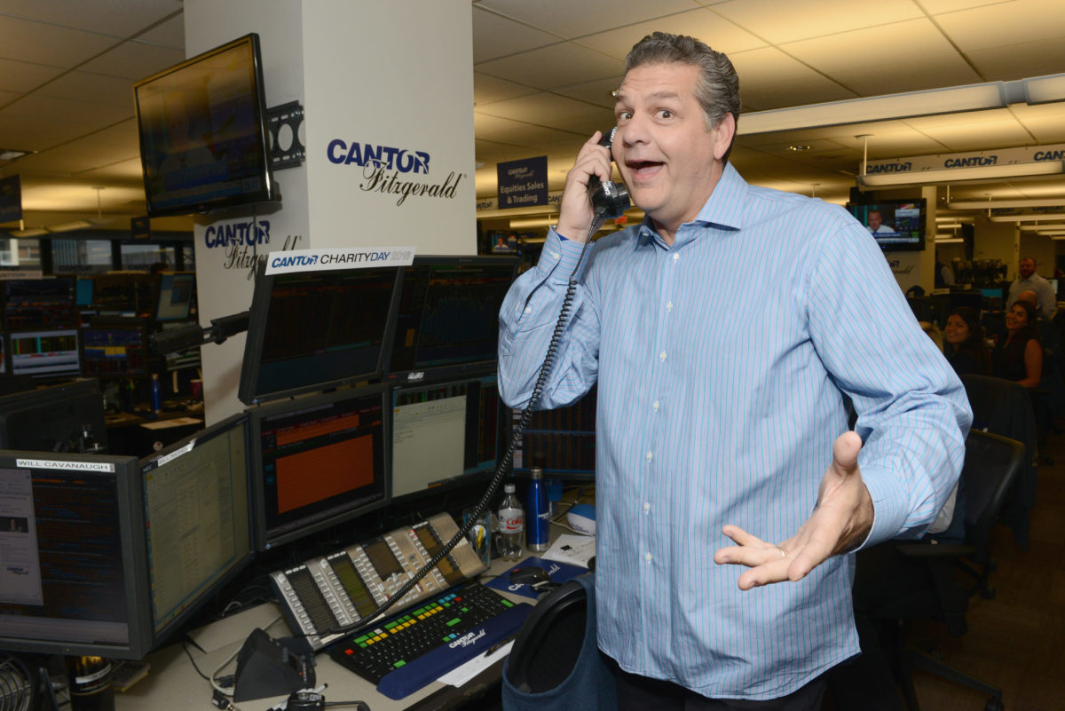 ESPN's Mike Golic answers a phone.