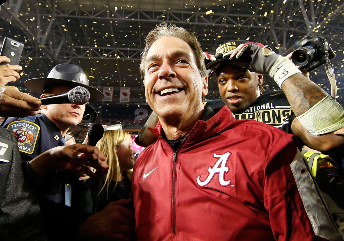 Head coach Nick Saban of the Alabama Crimson Tide celebrates after defeating the Clemson Tigers in the 2016 College Football Playoff National Championship Game.