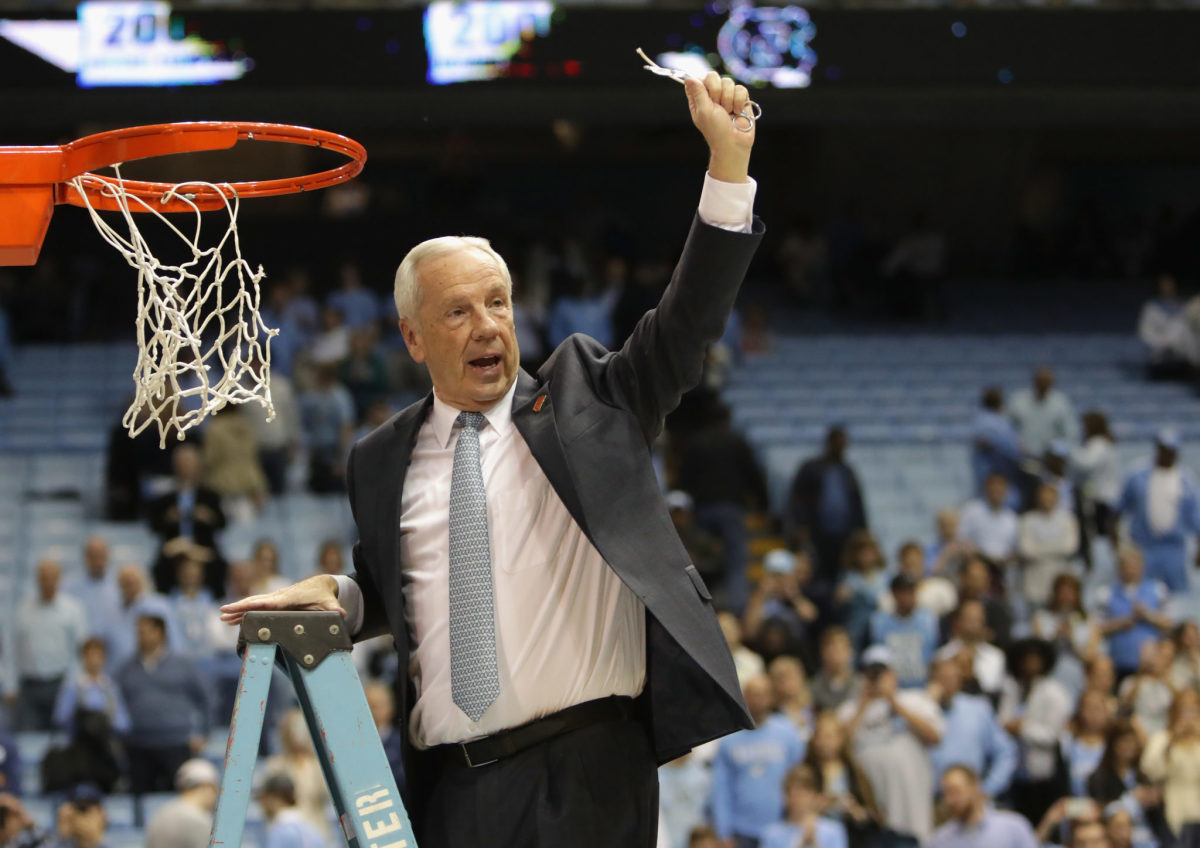 Roy Williams cuts down the net.