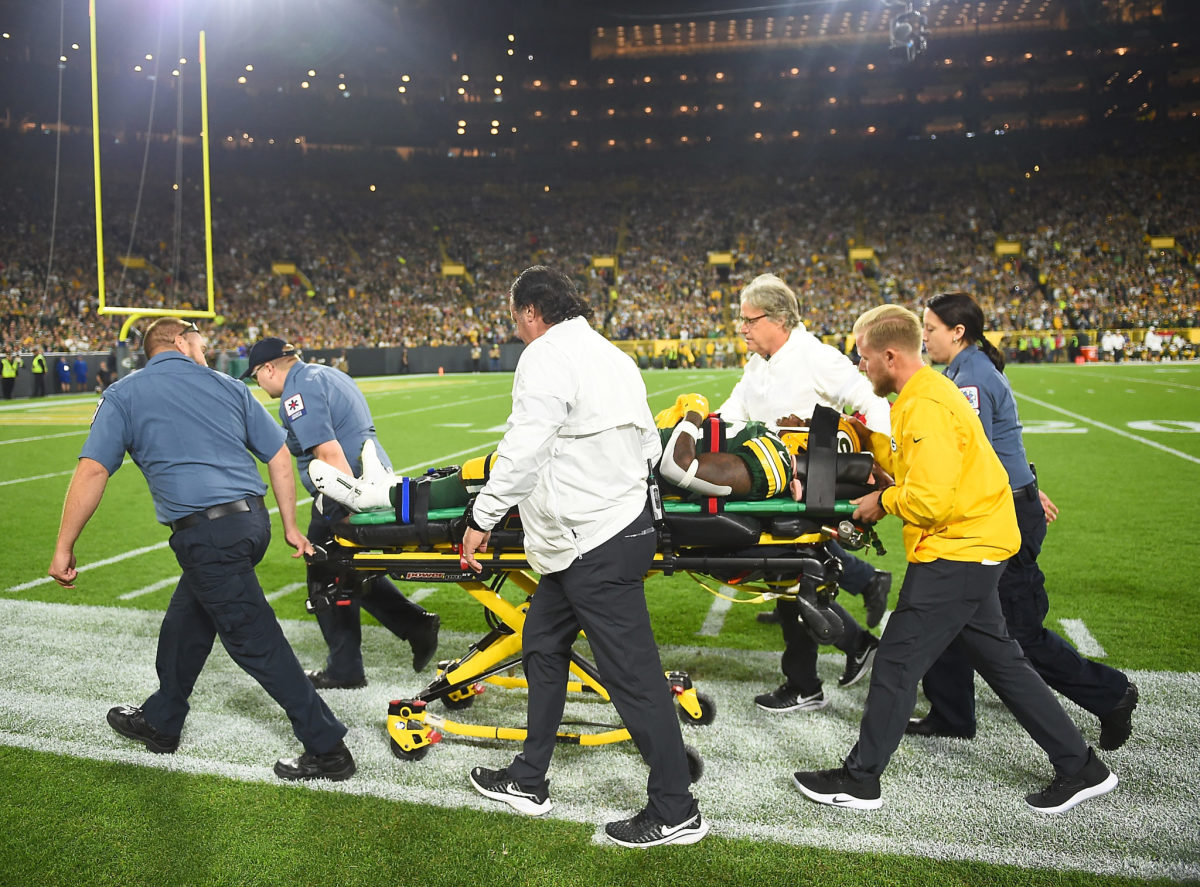 Jamaal Williams being carted off the field during the Packers vs. Eagles game.