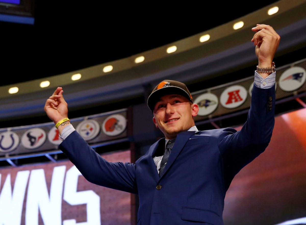 Johnny Manziel of the Texas A&amp;M Aggies takes the stage after he was picked #22 overall by the Cleveland Browns.