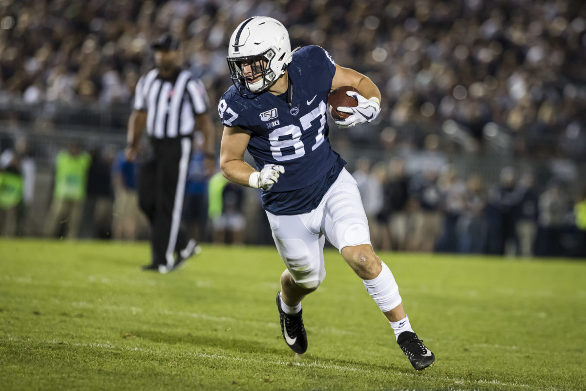 Pat Freiermuth of the Penn State Nittany Lions scores a touchdown.