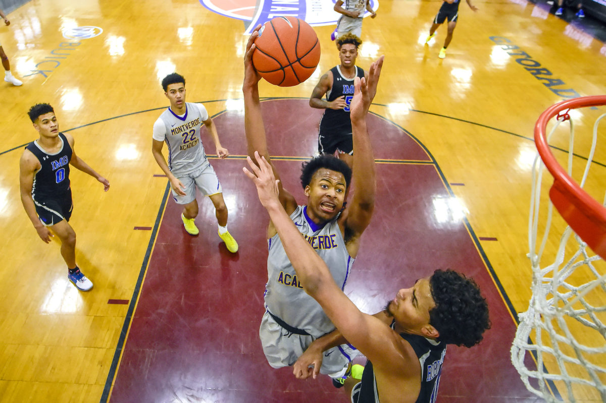 Montverde Academy's Moses Moody attempts a contested layup.