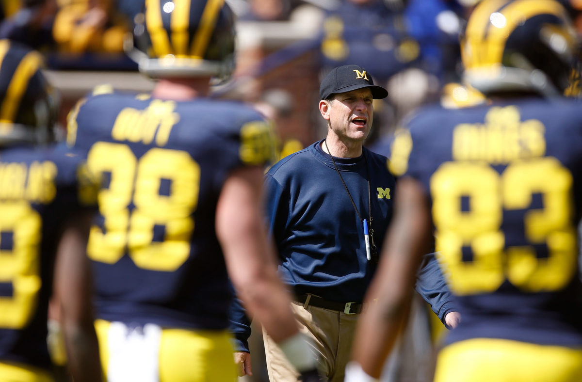 Head coach Jim Harbaugh of the Michigan Wolverines looks on during the Michigan Football Spring Game.