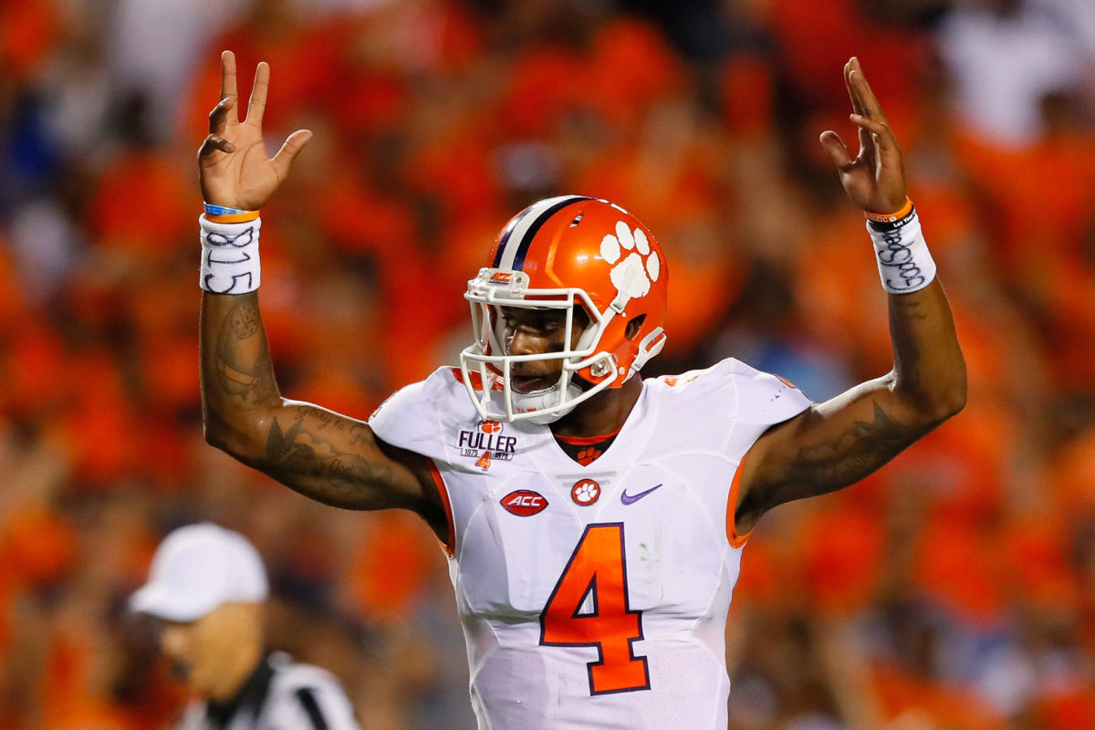 Deshaun Watson of the Clemson Tigers celebrates a rushing touchdown by Wayne Gallman #9 (not pictured) during the second quarter against the Auburn Tigers.