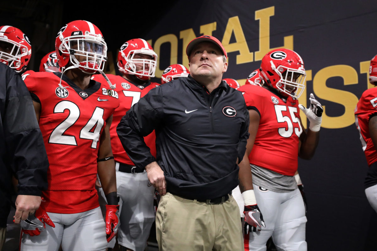Kirby Smart and his Georgia players waiting in the tunnel before walking onto the field.