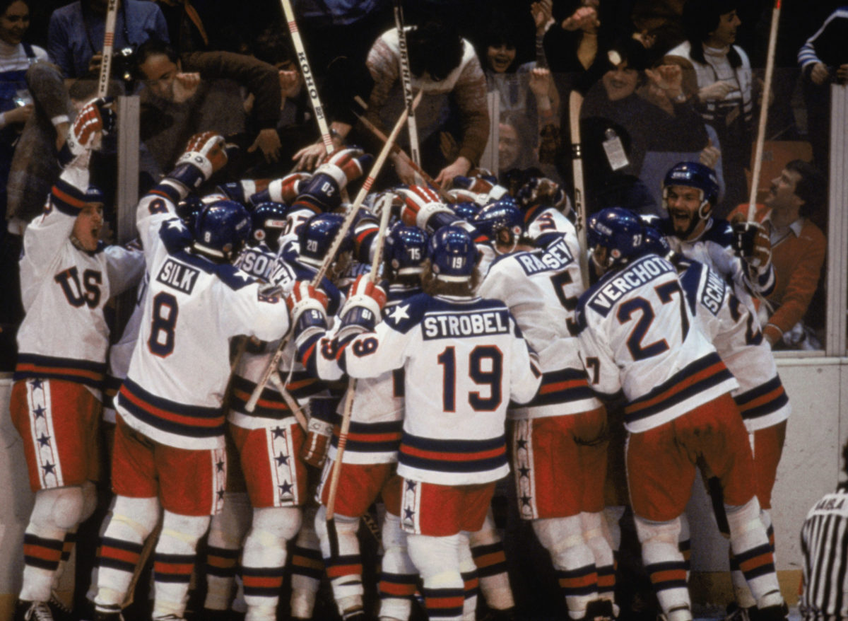 The United States Hockey team celebrating its win over Russia.