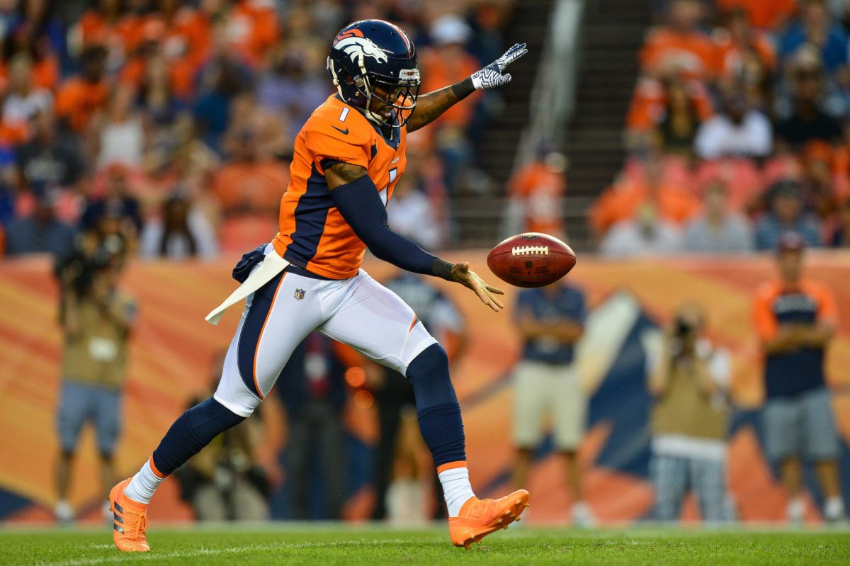 Marquette King punts in a game for the Denver Broncos.