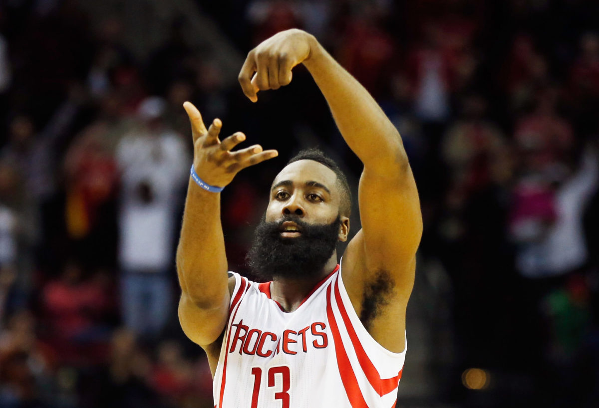 James Harden celebrating during a Houston Rockets vs. Brooklyn Nets game.