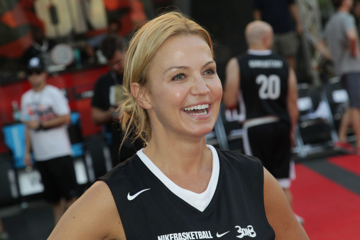 michelle beadle smiles during a game