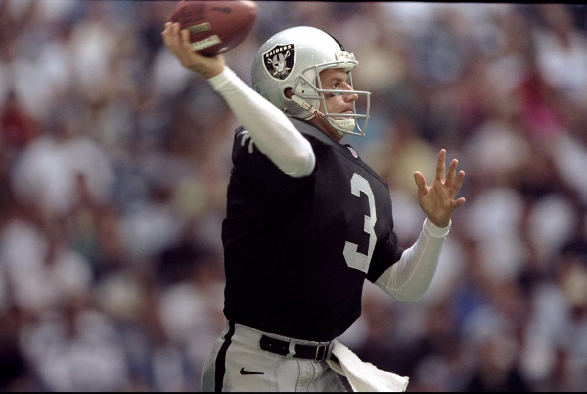 jeff george throws a pass during an nfl game