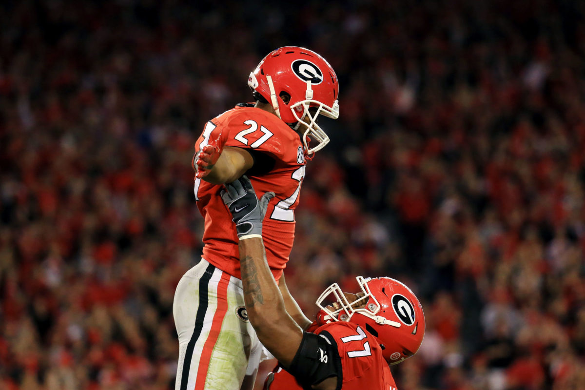 Georgia fans with a tribute to Nick Chubb 