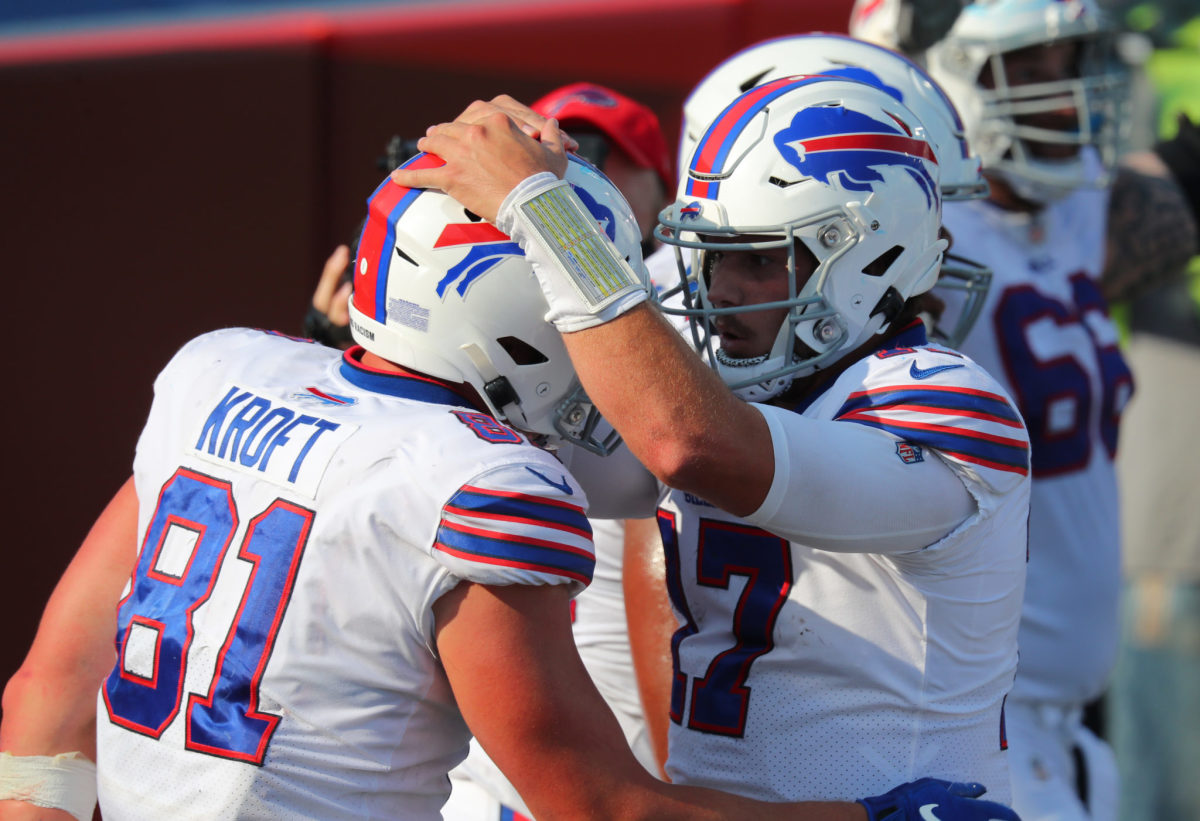 Buffalo Bills quarterback Josh Allen celebrates touchdown with tight end Tyler Kroft.