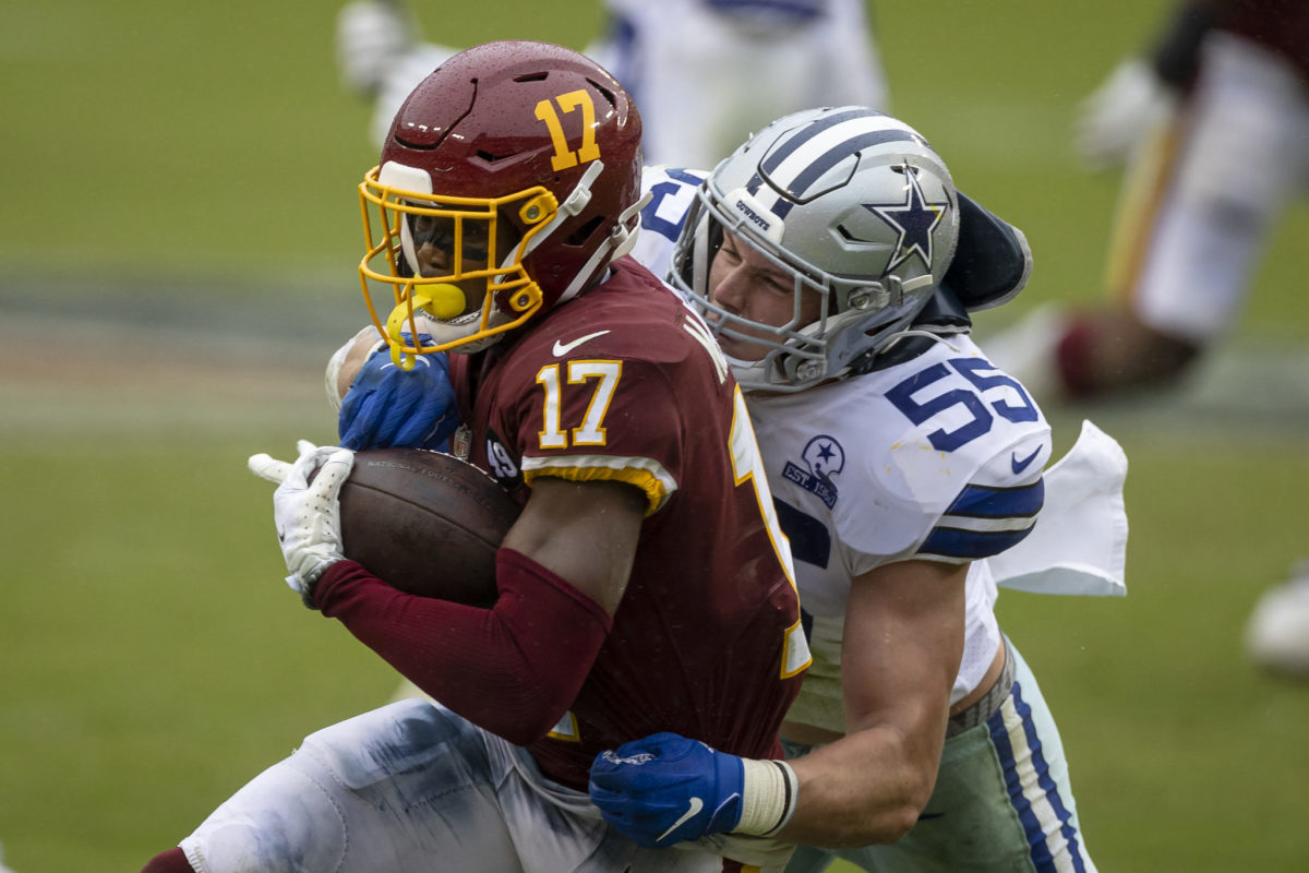 Washington wide receiver Terry McLaurin gets tackled by Dallas Cowboys LB Leighton Vander Esch.