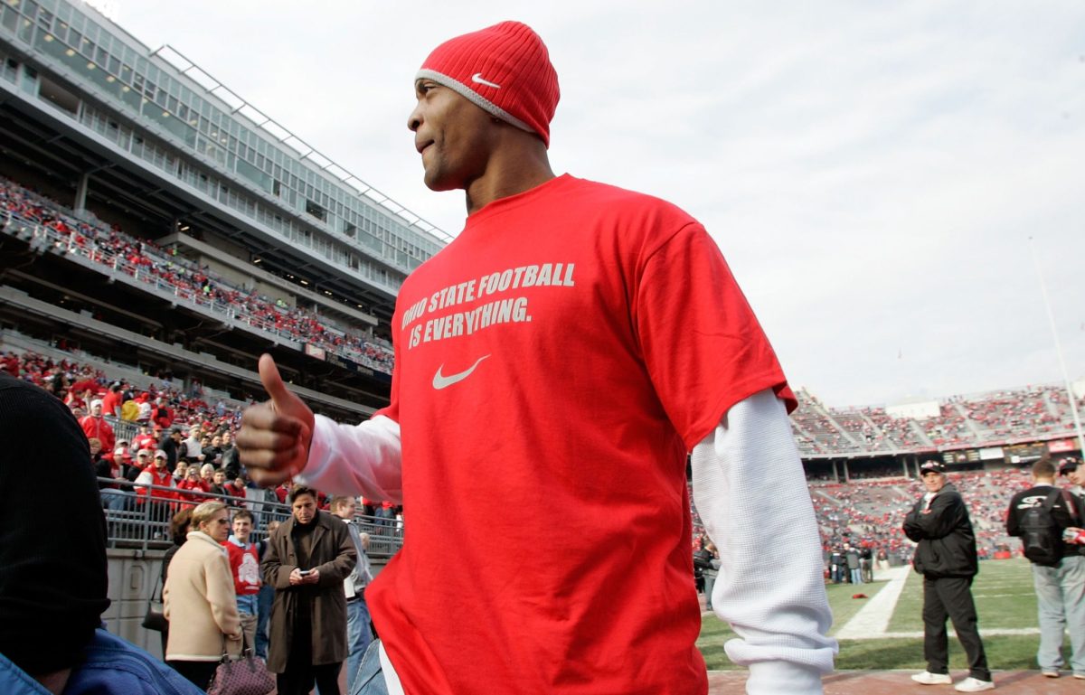 Eddie George hanging out on the sideline at an Ohio State game.