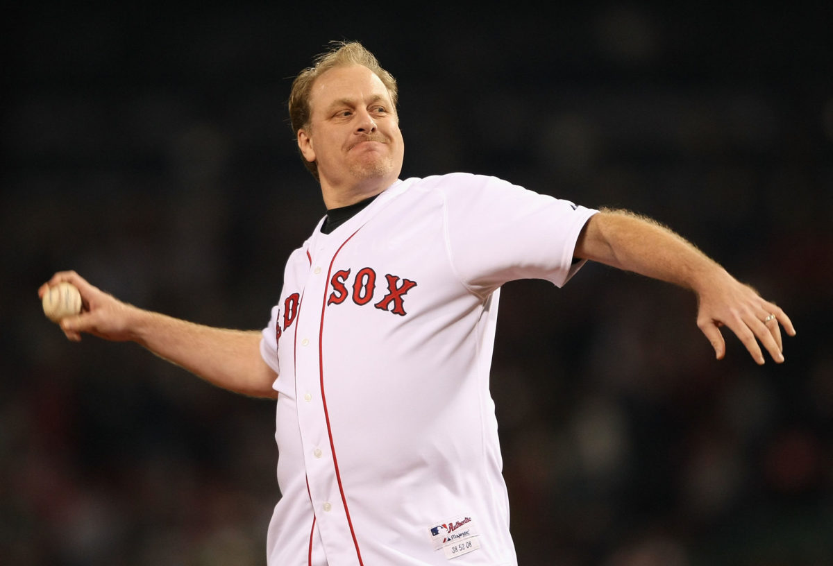 Curt Schilling throwing out the first pitch at a Red Sox game.