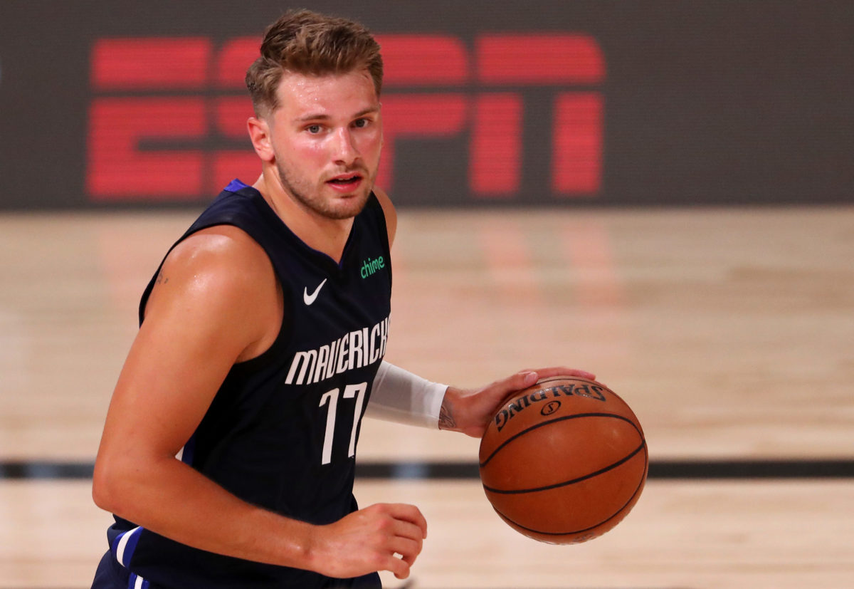 Dallas Mavericks star Luka Doncic dribbles the ball against the Houston Rockets in the NBA bubble.
