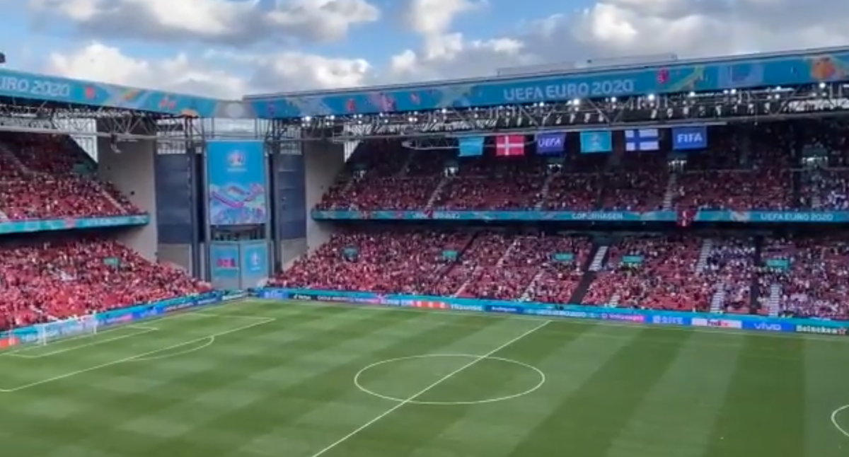 Denmark and Finland fans waiting for Euro match to restart after Christian Erikson collapse.
