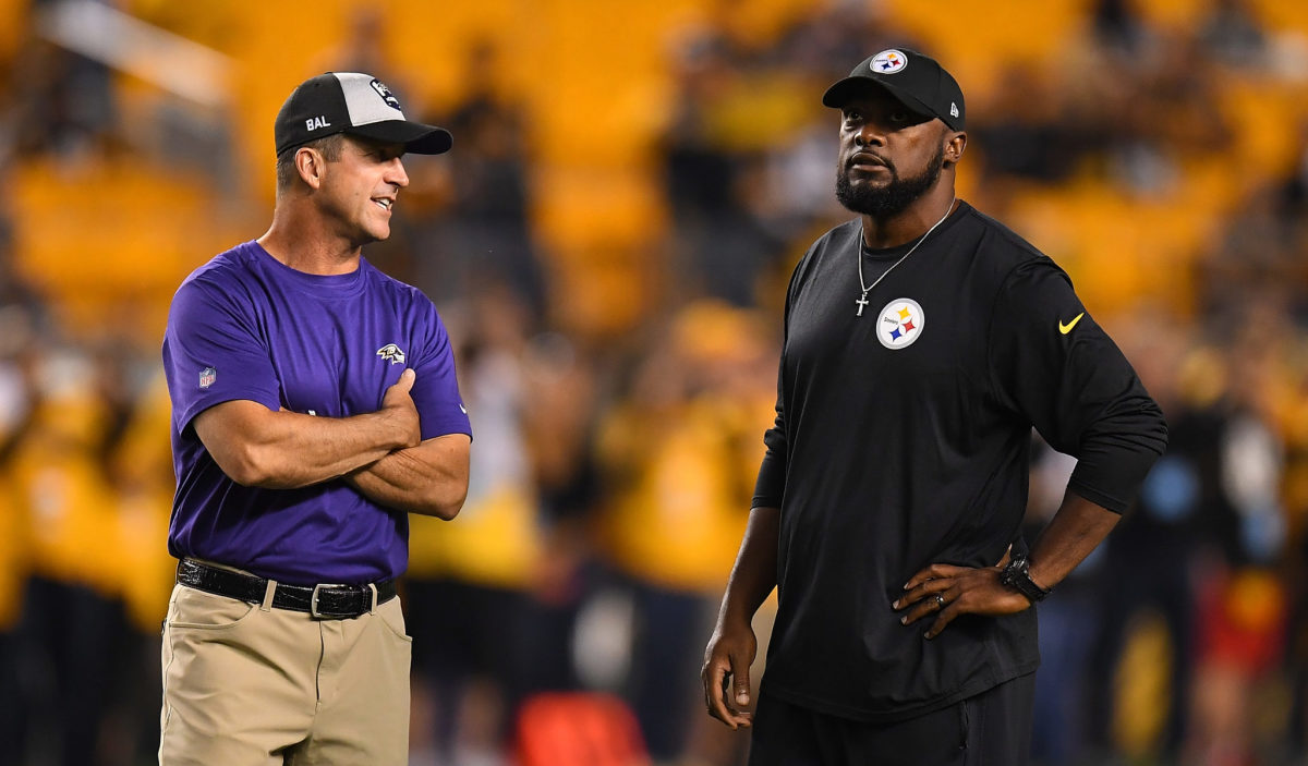 Mike Tomlin and John Harbaugh talk before a Pittsburgh Steelers vs. Baltimore Ravens game.