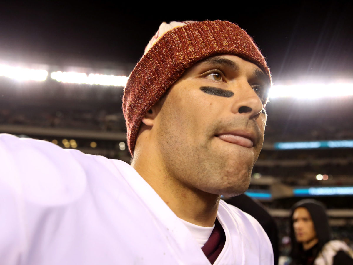 Mark Sanchez walks off the field for the Redskins.