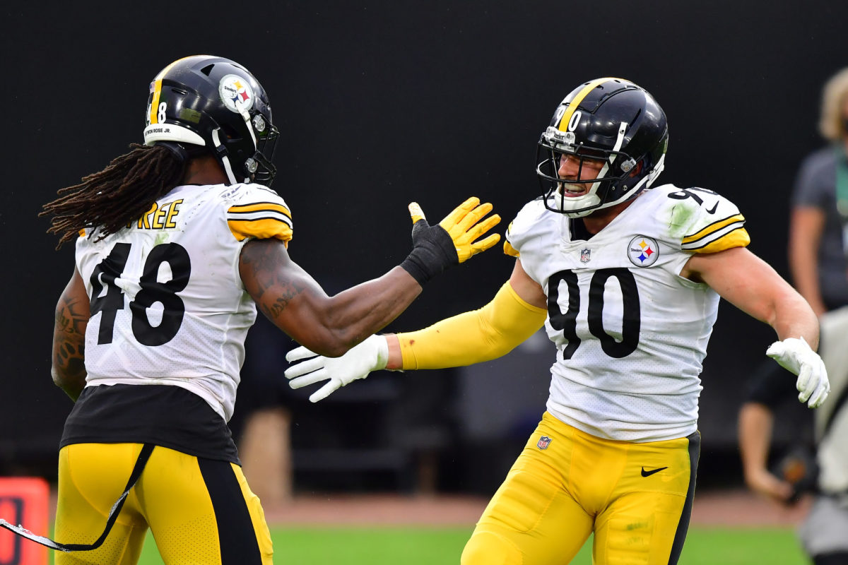 Pittsburgh Steelers outside linebackers T.J. Watt (90) and outside  linebacker Bud Dupree (48) on the sideline