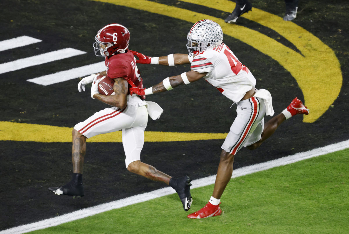 Alabama football star DeVonta Smith scores against Ohio State in the national title game.