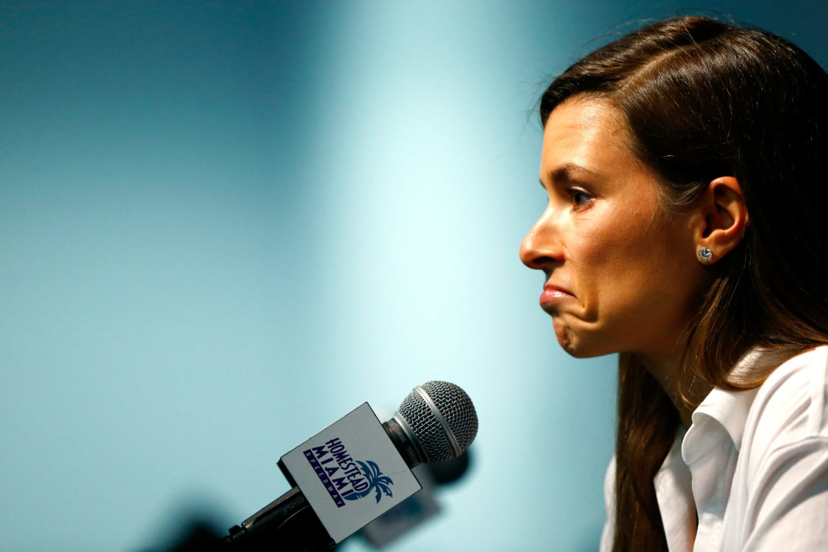 Danica Patrick speaking at a press conference.