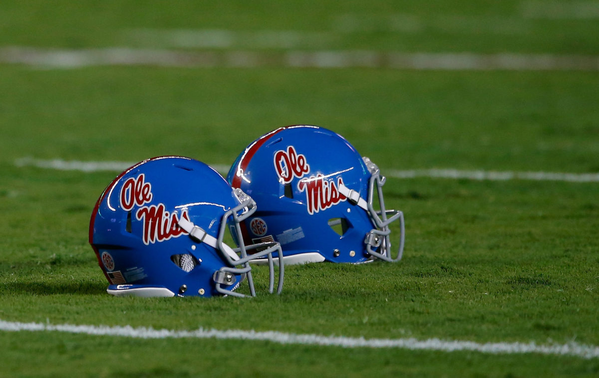 Ole Miss helmets on the field during a game.