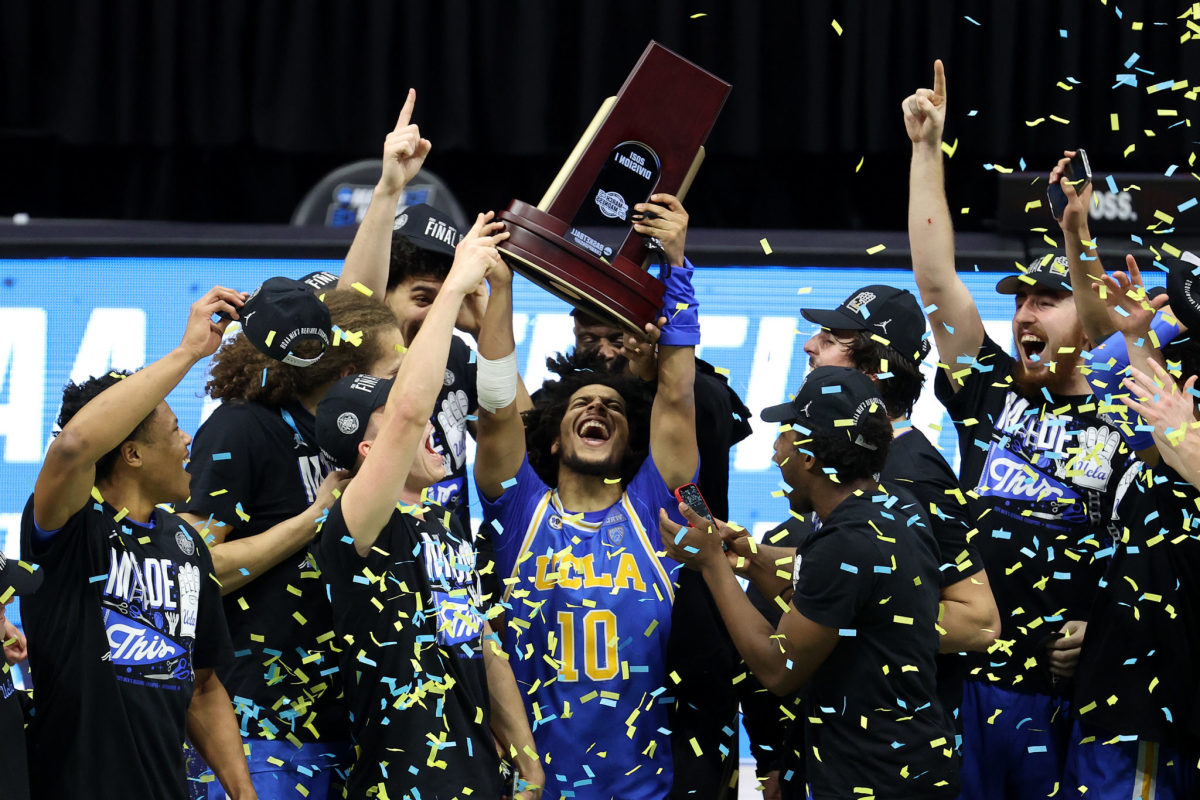UCLA players celebrate beating Michigan and making the Final Four.