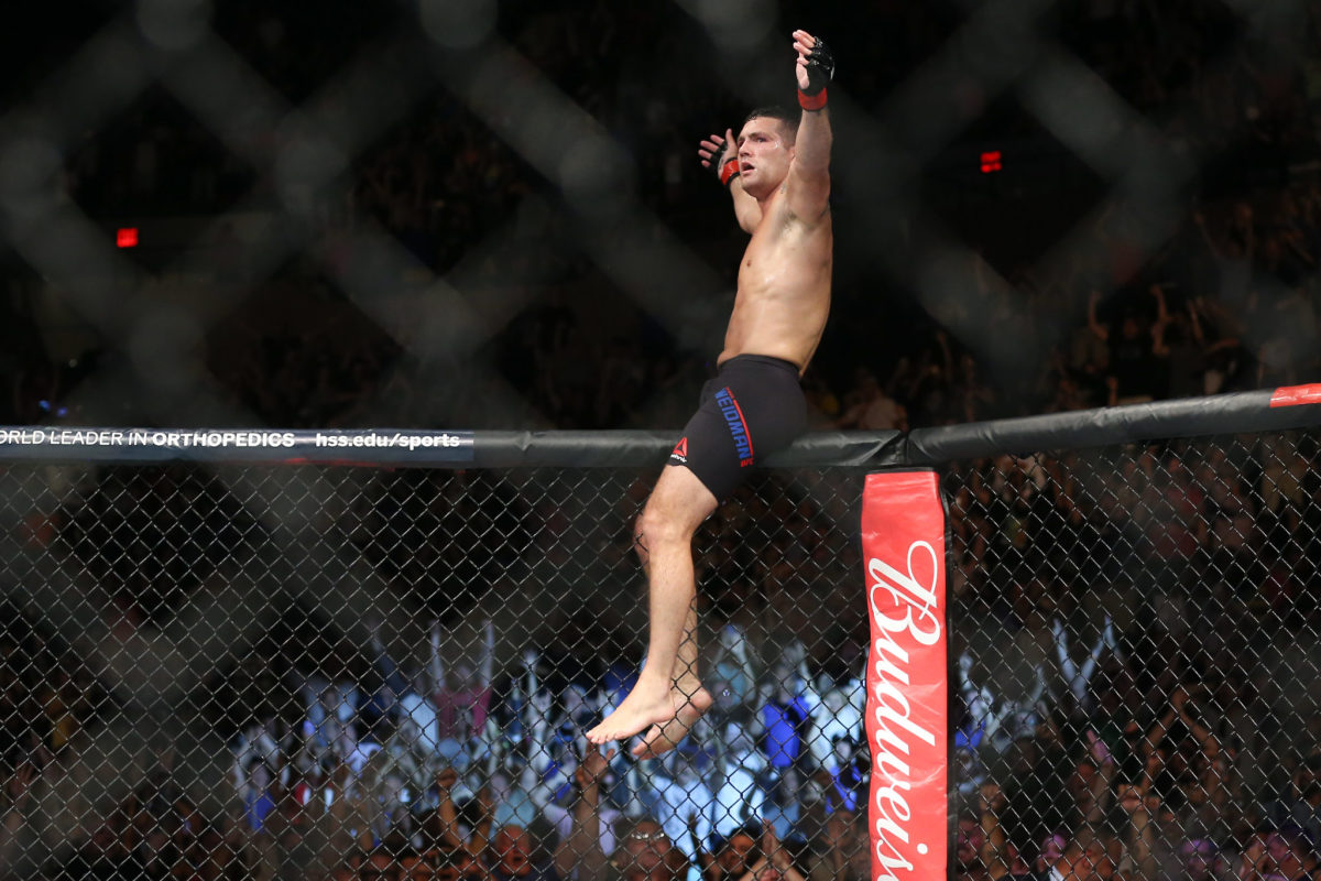 Chris Weidman celebrates a UFC victory in the octagon.