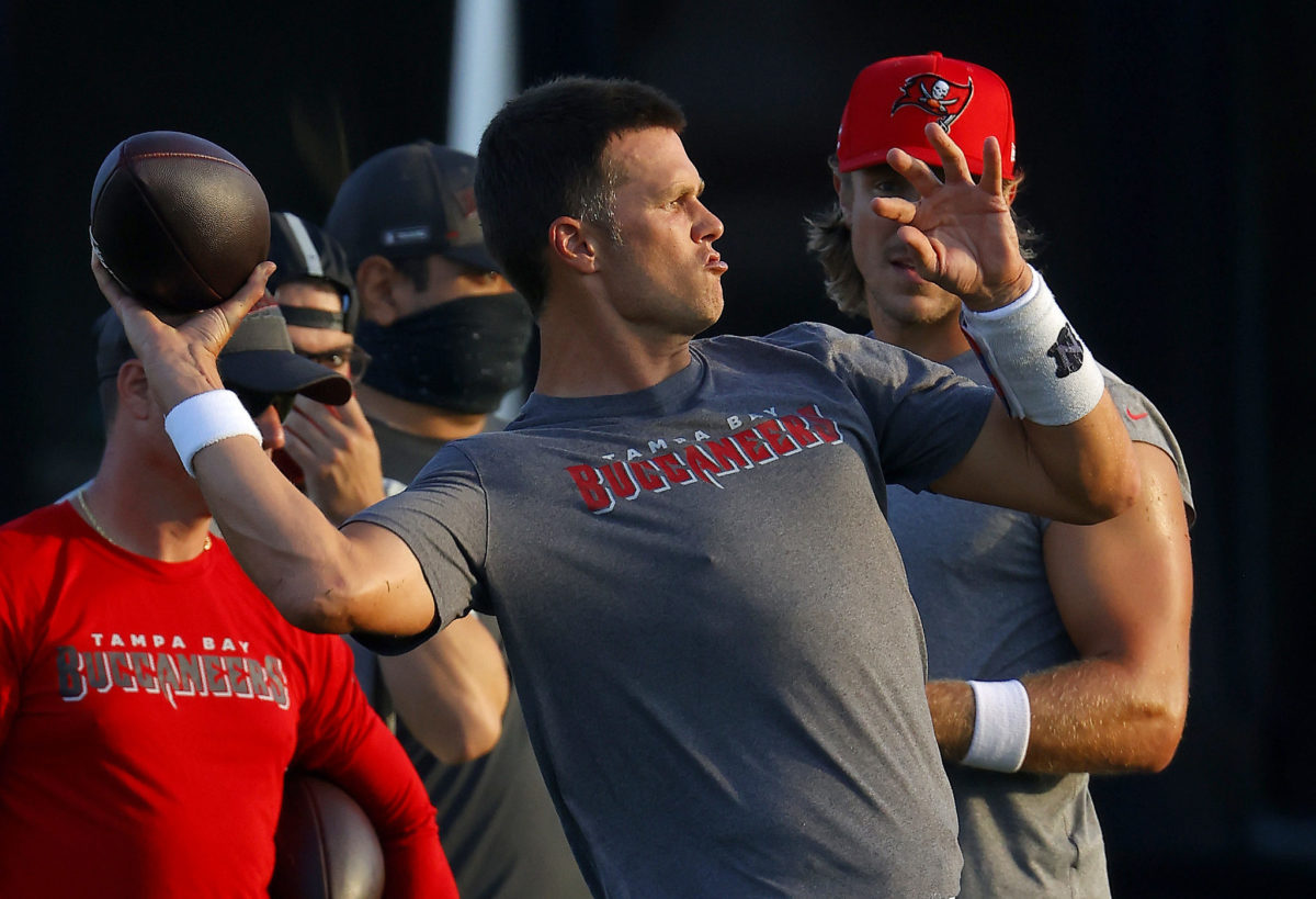 Tom Brady throws a pass in training camp for the Tampa Bay Buccaneers.