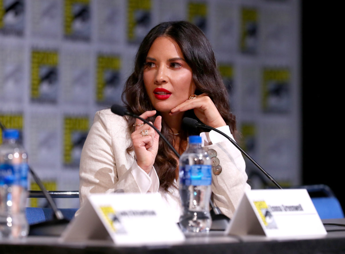Olivia Munn at a press conference event.