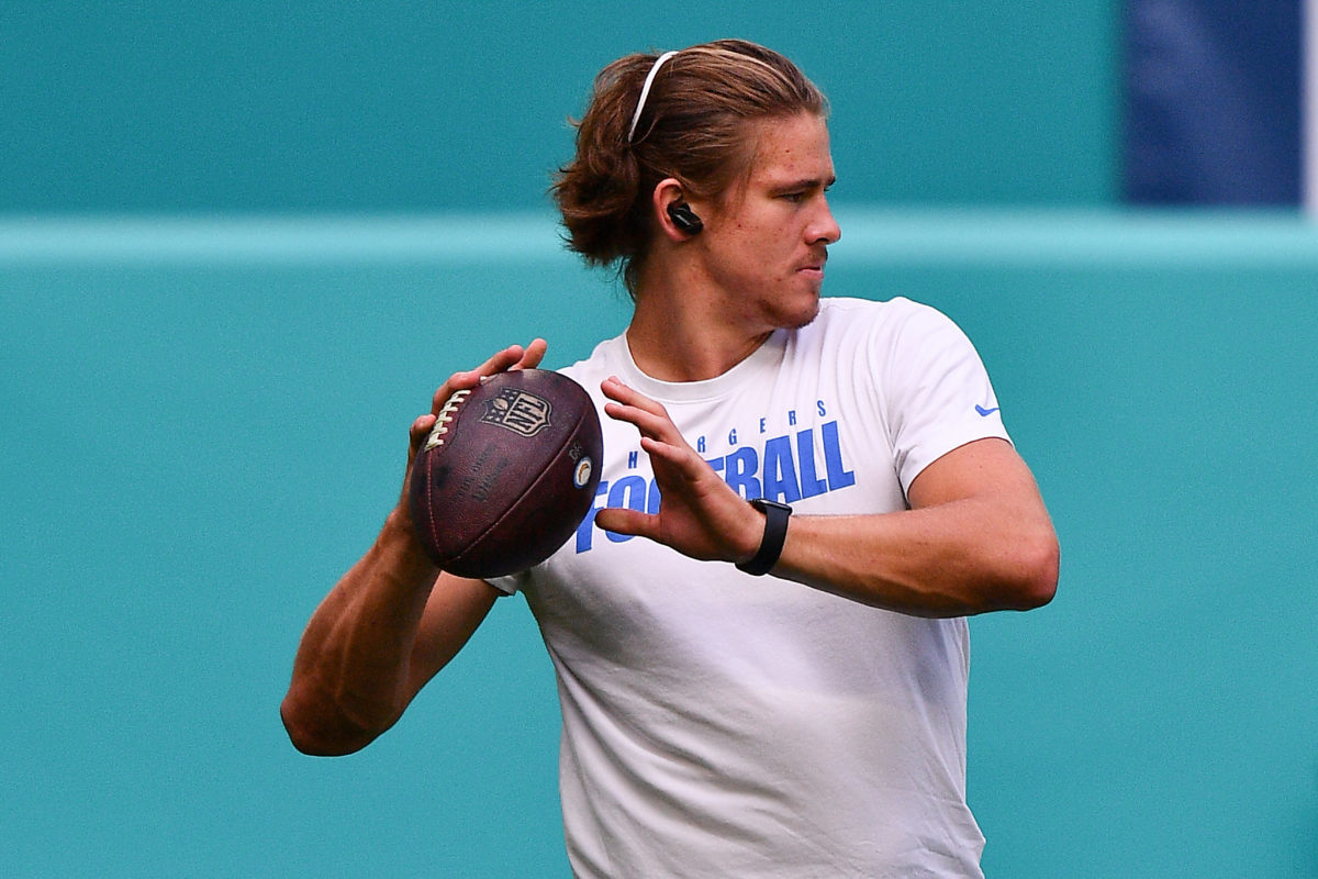 Justin Herbert warms up before a Los Angeles Chargers game.