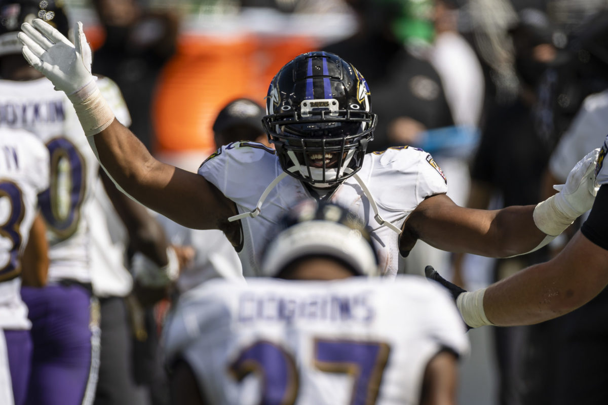 Mark Ingram II #21 of the Baltimore Ravens celebrates after J.K. Dobbins #27 scored a touchdown