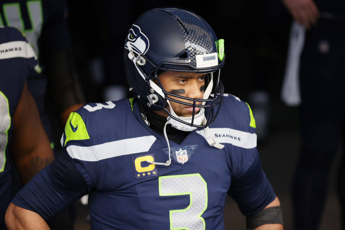 Quarterback Russell Wilson #3 of the Seattle Seahawks leads his team onto the field