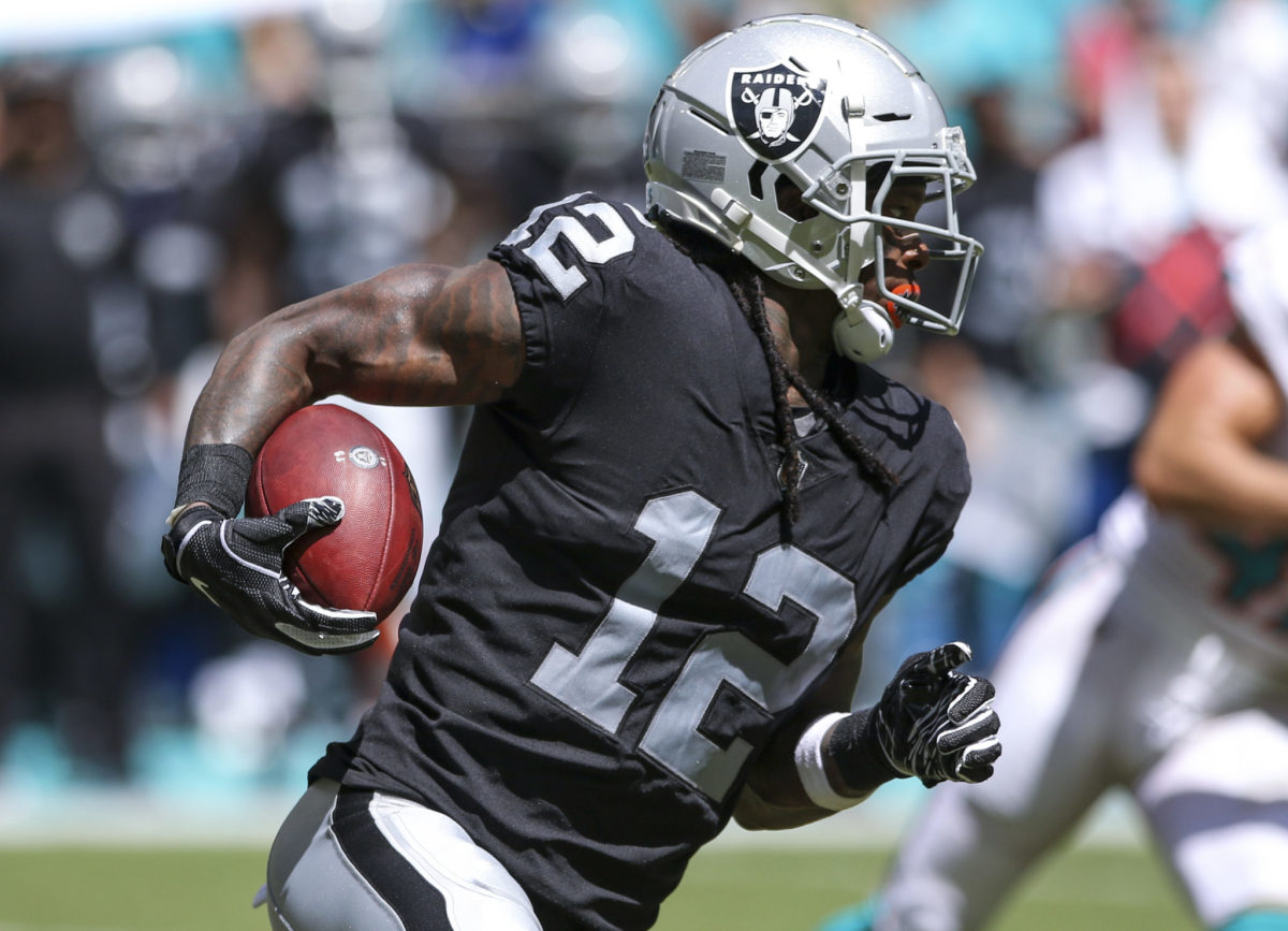 Martavis Bryant carrying the football during a game with the Raiders