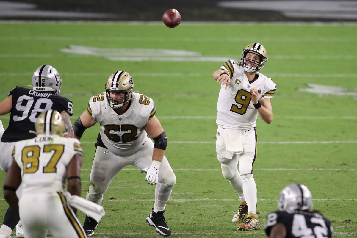 Drew Brees attempts a pass.